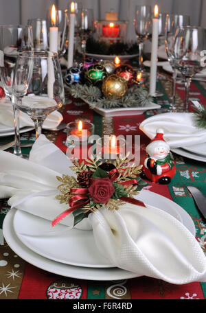 Decorative folded napkin on the Christmas table Stock Photo