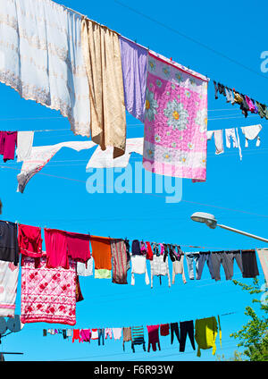 Clothes drying in traditional way on the street of Batumi, Georgia Stock Photo