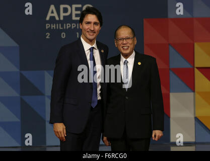 Manila. 19th Nov, 2015. Philippine President Benigno Aquino III (R) poses for a photo with Canadian Prime Minister Justin Trudeau before the start of the 23rd APEC Economic Leaders' Meeting in Manila, the Philippines, Nov. 19, 2015. Credit:  Xinhua/Alamy Live News Stock Photo