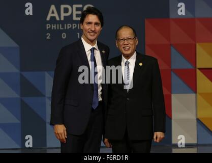 Manila, Philippines. 19th November, 2015. Philippine President Benigno Aquino III greets Canadian Prime Minister Justin Trudeau during the APEC Leaders Summit at the Philippine International Convention Center November 19, 2015 in Pasay City, Manila, Philippines. Stock Photo