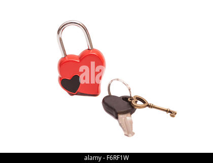 Locked shaped heart and keys isolated on white Stock Photo