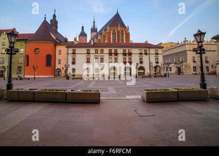 Krakow, Poland, 04 November 2015. The small market square near Mariacki church, perspective view of building's walls. Image is t Stock Photo