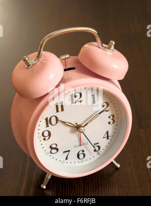 Classic pink metallic alarm clock  Model Release: No.  Property Release: No. Stock Photo