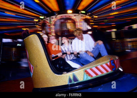 Young people on the Waltzer ride at Bottons Pleasure Beach Skegness. Lincolnshire. England. UK Stock Photo