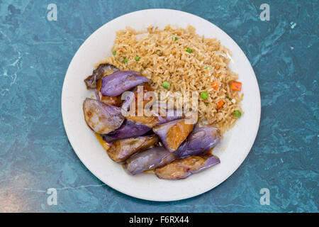 Chinese sauteed eggplant with oyster sauce and fried rice Stock Photo