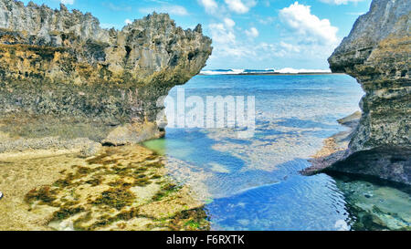 Amazing natural beauty of Norfolk Island coastline, photo taken looking out between  jagged rocks on the reef Stock Photo