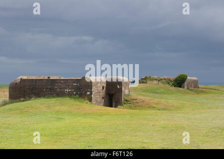 Two of the concrete casemates at the Longues-sur-Mer battery in Normandy Stock Photo