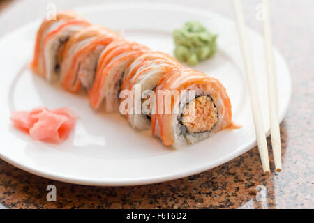 Beautiful spicy crab roll with wasabi and fresh pickled ginger Stock Photo