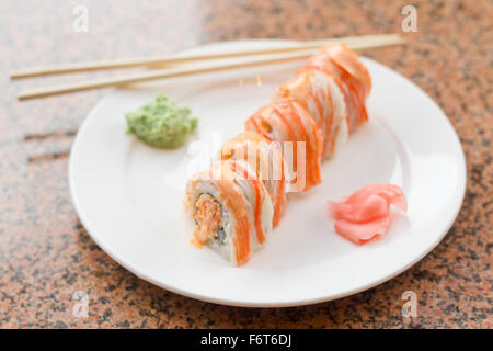 Beautiful spicy crab roll with wasabi and fresh pickled ginger Stock Photo