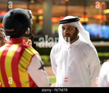 Meydan Racecourse, UAE. 19th November, 2015.   Trainer Musabah Al Mohair with Royston Ffrench before race 4 at Meydan Racecourse Credit:  Tom Morgan/Alamy Live News Stock Photo