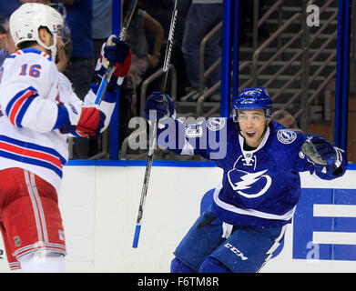 Tampa, Florida, USA. 19th Nov, 2015. Tampa Bay Lightning right wing J.T. BROWN (23) celebrates as he picks up the assist on the game winning shorthanded goal scored by Tampa's center to beat New York Rangers goalie in the final minutes of the third period at the Amalie Arena. Credit:  Dirk Shadd/Tampa Bay Times/ZUMA Wire/Alamy Live News Stock Photo