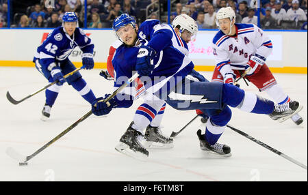Tampa, Florida, USA. 19th Nov, 2015. DIRK SHADD | Times .Tampa Bay Lightning center Steven Stamkos (91) gets twirled down to the ice while fighting to control the puck against the New York Rangers during third period action at the Amalie Arena in Tampa Thursday evening (11/19/15) Credit:  Dirk Shadd/Tampa Bay Times/ZUMA Wire/Alamy Live News Stock Photo