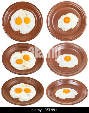 Fried egg on plate isolated on white background, top view Stock Photo ...