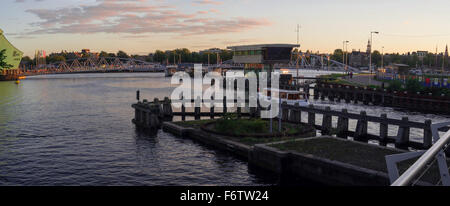 Panoramic view on Oosterdok and Science Center Nemo at sunset in Amsterdam Stock Photo