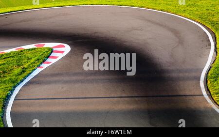 An empty bend on a race car circuit. Stock Photo