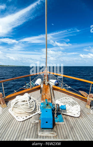 Sailing boat on the wide open ocean Stock Photo