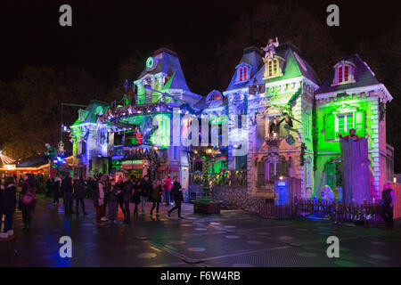 London, UK. 19 November 2015. A haunted mansion. Hyde Park Winter Wonderland opens with many attractions such as fairground rides, Christmas markets, a circus and a Bavarian Beer Village. The fairground is open until 3 January 2016. Credit:  Vibrant Pictures/Alamy Live News Stock Photo