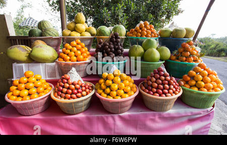 tropical fruits in baskets on fruit market, Kintamani, Bali Indonesia Stock Photo