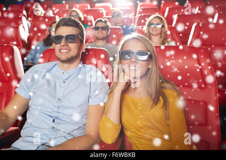 happy couple watching movie in 3d theater Stock Photo