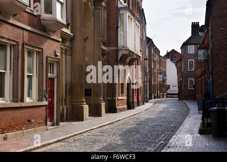 UK, England, Yorkshire, Hull, High Street, historic buildings lining narrow street in old town Stock Photo