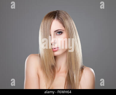 Portrait of an young blonde beauty with straight hair Stock Photo