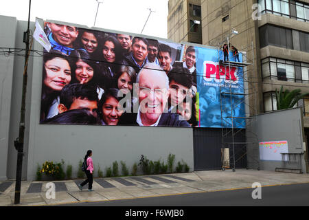 People putting up giant poster for Pedro Pablo Kuczynski's PPK party presidential election campaign, Miraflores, Lima, Peru Stock Photo