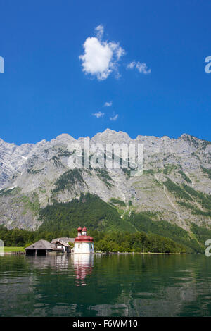 Baroque style pilgrimage church St Bartholomae, Watzmann east wall in the background, Koenigssee, Berchtesgaden region, Berchtes Stock Photo