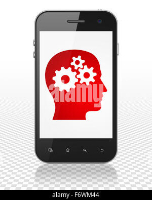 Marketing concept: Smartphone with Head With Gears on display Stock Photo