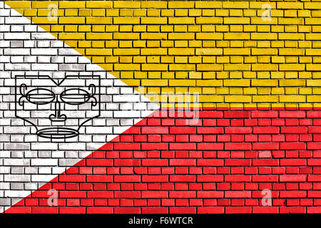 flag of Marquesas Islands painted on brick wall Stock Photo