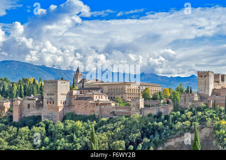 GRANADA ANDALUCIA SPAIN THE ALHAMBRA WITH STORM CLOUDS OVER THE SIERRA NEVADA Stock Photo