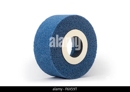 A blue abrasive wheel made out of corundum for a grinder, photographed in the studio on a white background. Grinding wheel. Stock Photo