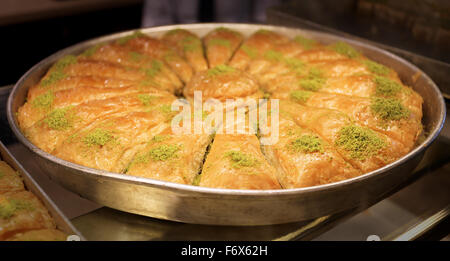 Tasty Oriental sweets baklava on a plate is photographed close-up Stock Photo