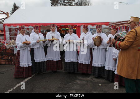 traditional Belorussian greeting of great guests on celebration of new harvest, November, 13, 2015, Vileyka, Belarus Stock Photo