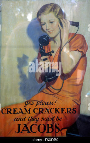 Jacobs Cream Crackers food ad advert advertisement poster & 1930s 1940s woman talking on an old style telephone in England Great Britain UK   KATHY DEWITT Stock Photo