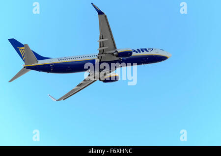 Aircraft -Boeing 737-8AS-, of -Ryanair- airline,is taking off from Madrid-Barajas -Adolfo Suarez- airport,when it's getting dark Stock Photo