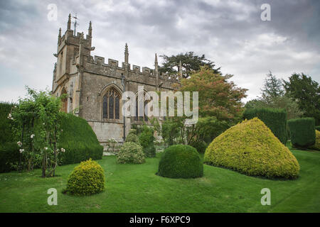 Ancient rural church in grounds, England Stock Photo