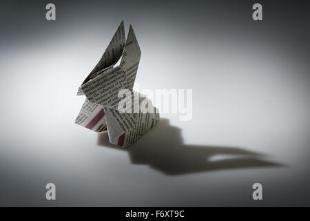 Still life image of a origami rabbit make from news paper Stock Photo