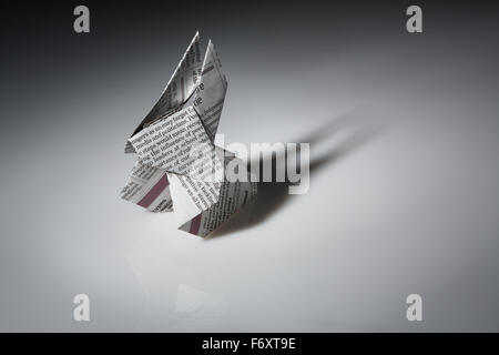 Still life image of a origami rabbit make from news paper Stock Photo