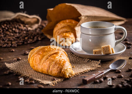 Breakfast concept: coffee and croissant Stock Photo