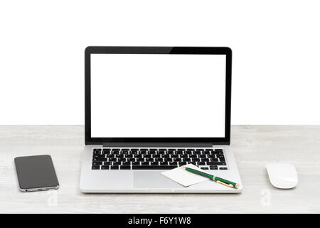 The laptop on the table with the mouse and smartphone Stock Photo