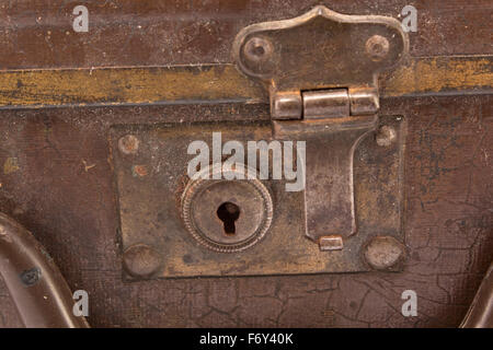 Rusty, dusty lock on an old suitcase. Stock Photo