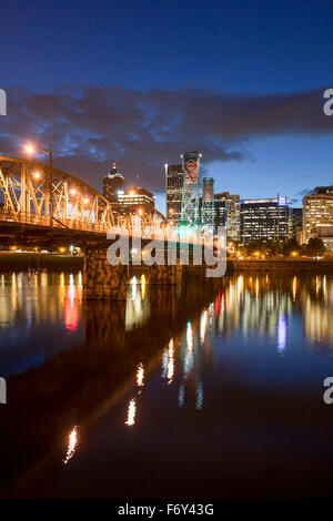 Twilight view of the skyline and Hawthorne Bridge in Portland, Oregon. Stock Photo