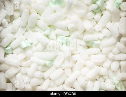 background image of polystyrene packing bits in a cardboard box Stock Photo