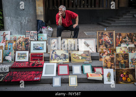 Man selling paintings at Shota Rustaveli Avenue in Tbilisi, capital of Georgia Stock Photo