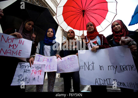 Rome, Italy. 21st Nov, 2015. Young women hold banners during a demonstration in Rome, Italy, on Nov. 21, 2015. A demonstration launched by Islamic communities with the theme 'Not in My Name' is held here on Saturday to protest against the Paris terror attacks. Credit:  Jin Yu/Xinhua/Alamy Live News