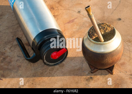 Traditional mate drinking equipment on a rustic table Stock Photo