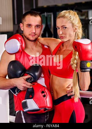 Female boxer with your male coach after workout. Stock Photo