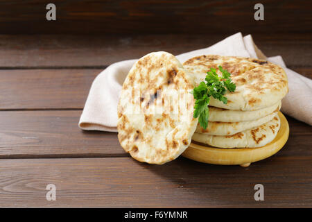 stack of homemade tortillas pita on a wooden table Stock Photo