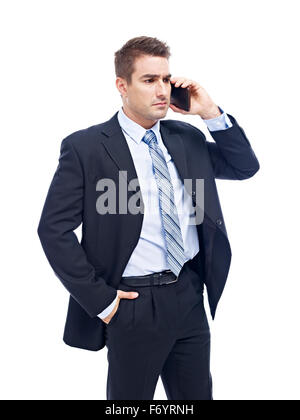 caucasian business person talking on cellphone looking serious and upset Stock Photo