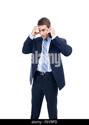 caucasian business person talking on cellphone, disappointed and frustrated Stock Photo
